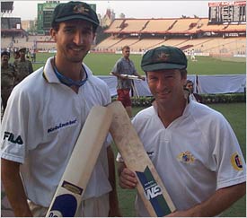 Gilly and Tugga pose after their record-breaking partnership