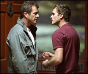 Joaquin Phoenix and Mel Gibson in Signs