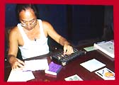 K C Chen with abacus 