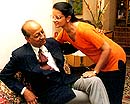His daughter Dr Roshni kisses her father. Click for bigger picture
