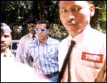 Salman Khan (in dark glasses) arriving at the court
