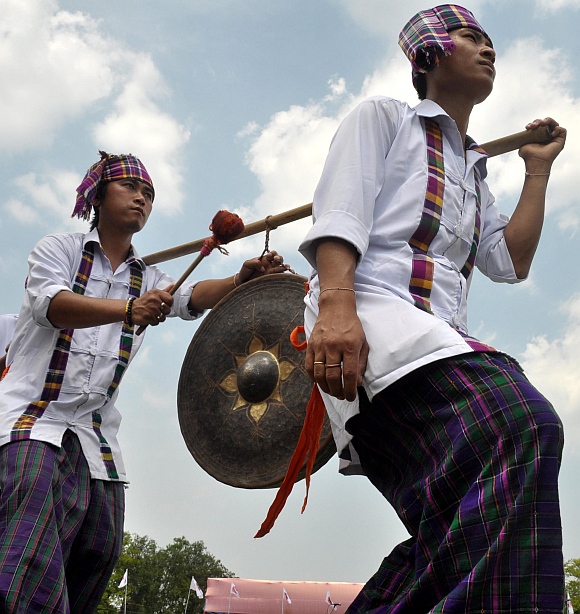 Artists from the Tai Phake tribe perform their traditional dance