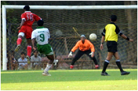 No.9 (Dyanand) takes a shot at Mahindra's goal